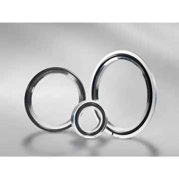 Precision centering rings for ISO KF NW vacuum fittings displayed on a clean industrial surface