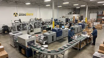 DiscBurn production facility showing disc duplication and packaging equipment