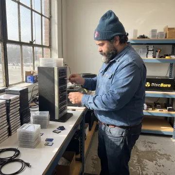 Technician preparing preloaded SD cards