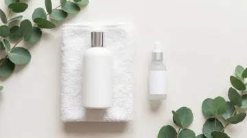 Clean beauty hair serum product lineup with lightweight silicone-free formulations on display