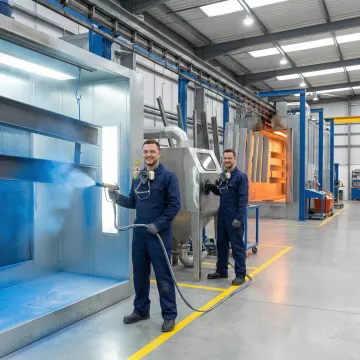 Professional metal finishing services including powder coating and plating in an industrial facility in Houston, TX