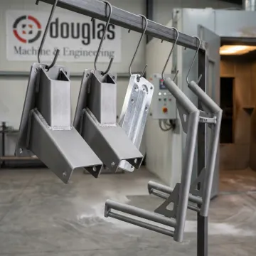 Metal parts prepared for coating after blast cleaning