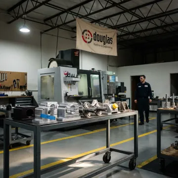 Industrial powder coated metal parts in a finishing shop