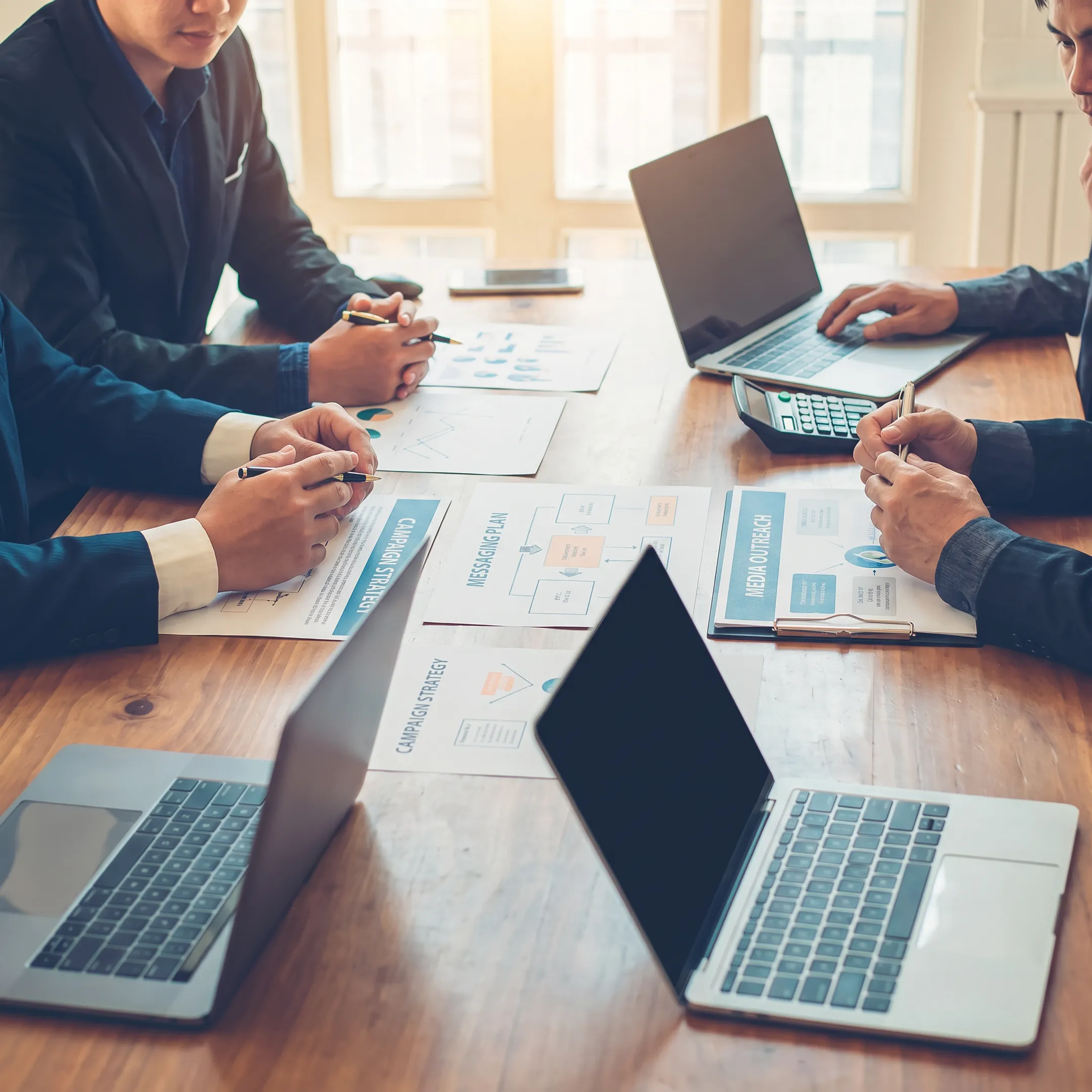 Communications agency team developing marketing and public relations strategy