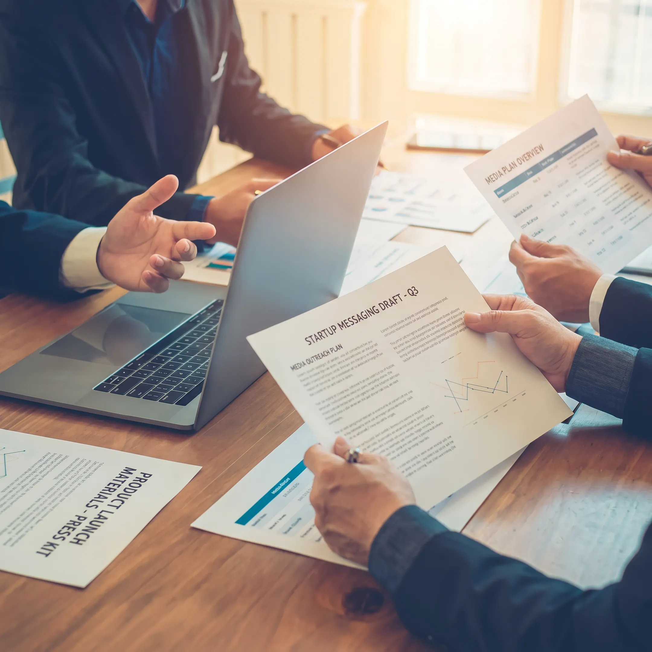 PR strategists developing a startup media and communications campaign