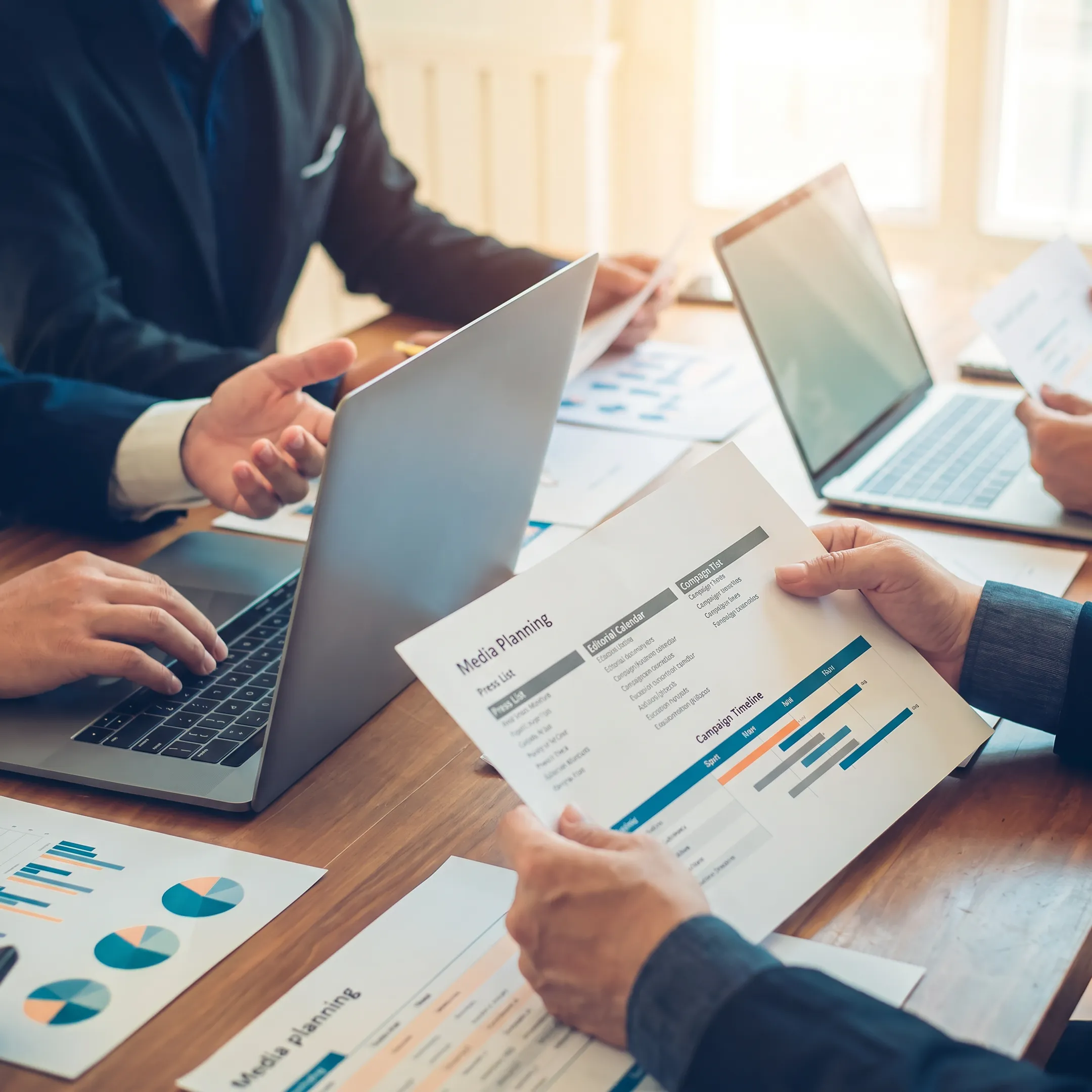 PR professionals developing media strategy and communications content for a contractor