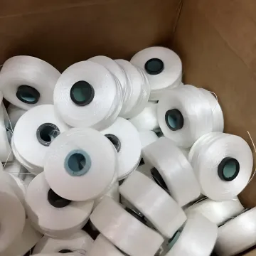 Embroidery Bobbins — Pre-Wound & Empty Bobbins for Commercial Embroidery Machines (USA) | Machine Embroidery Bobbin Thread