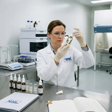 Scientist developing a nasal spray formulation