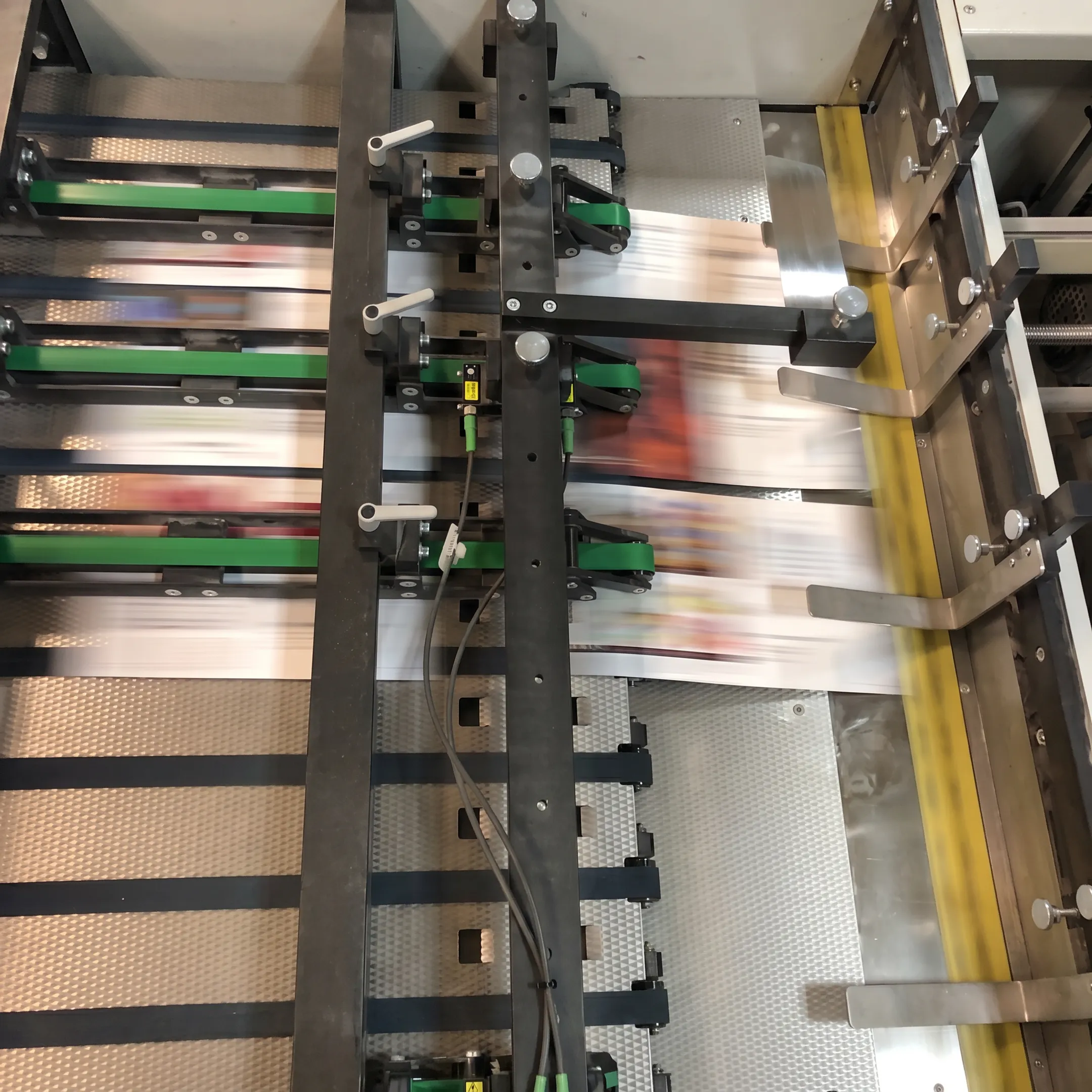 Telecom direct mail campaign moving through print and finishing production
