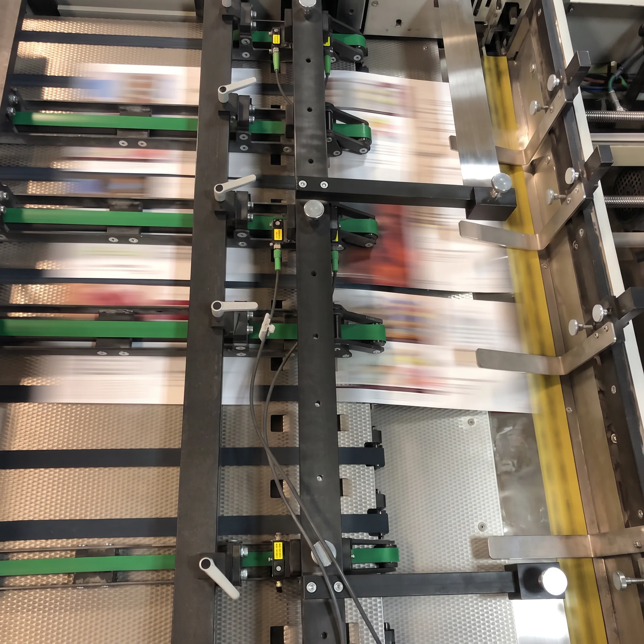 Personalized direct mail pieces moving through production