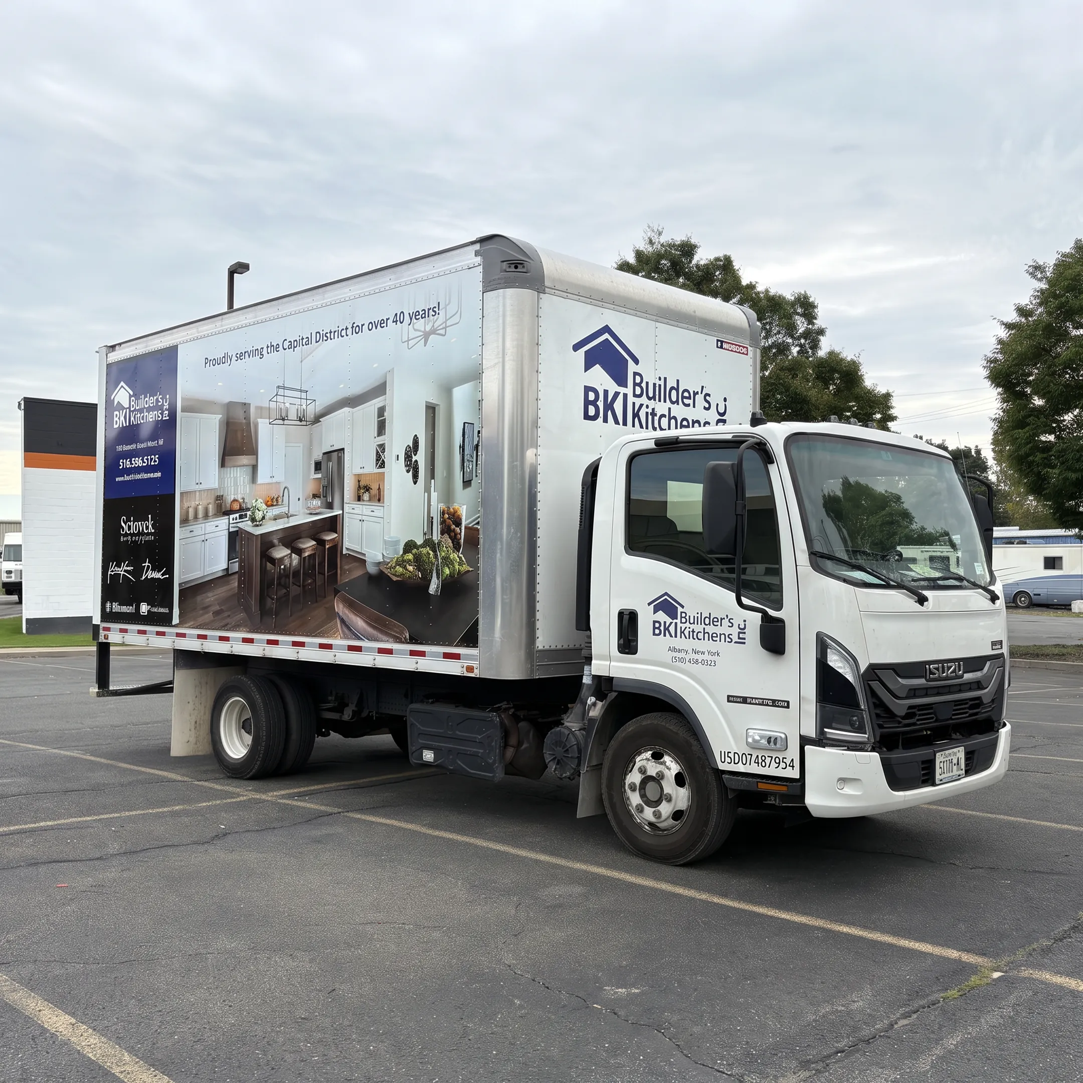 Finished branded vehicle wrap outside a business facility