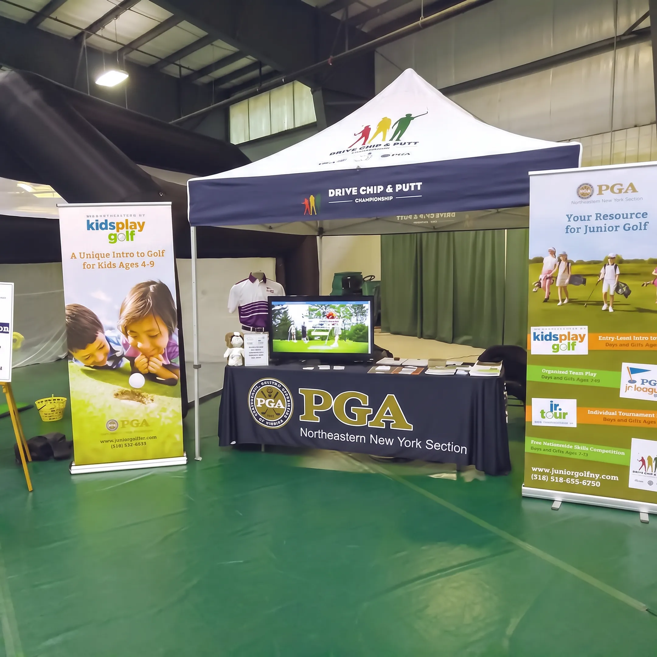 Printed retractable banner stand in a branded event space