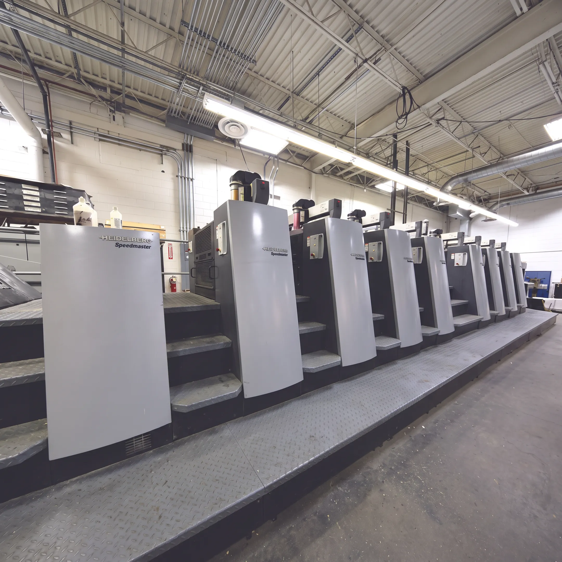 Corporate print materials and branded signage prepared for production
