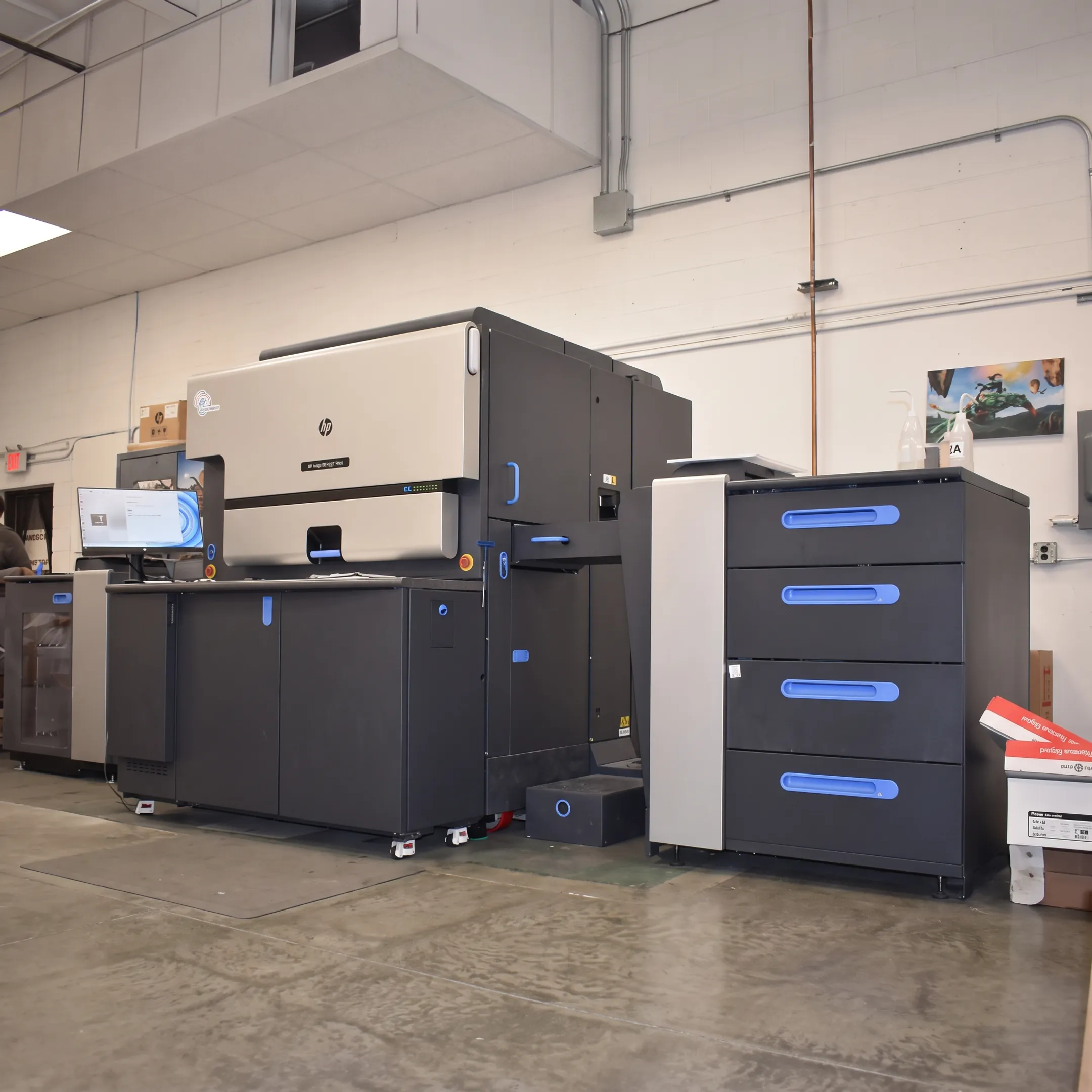Print and mail team preparing personalized business materials for USPS delivery