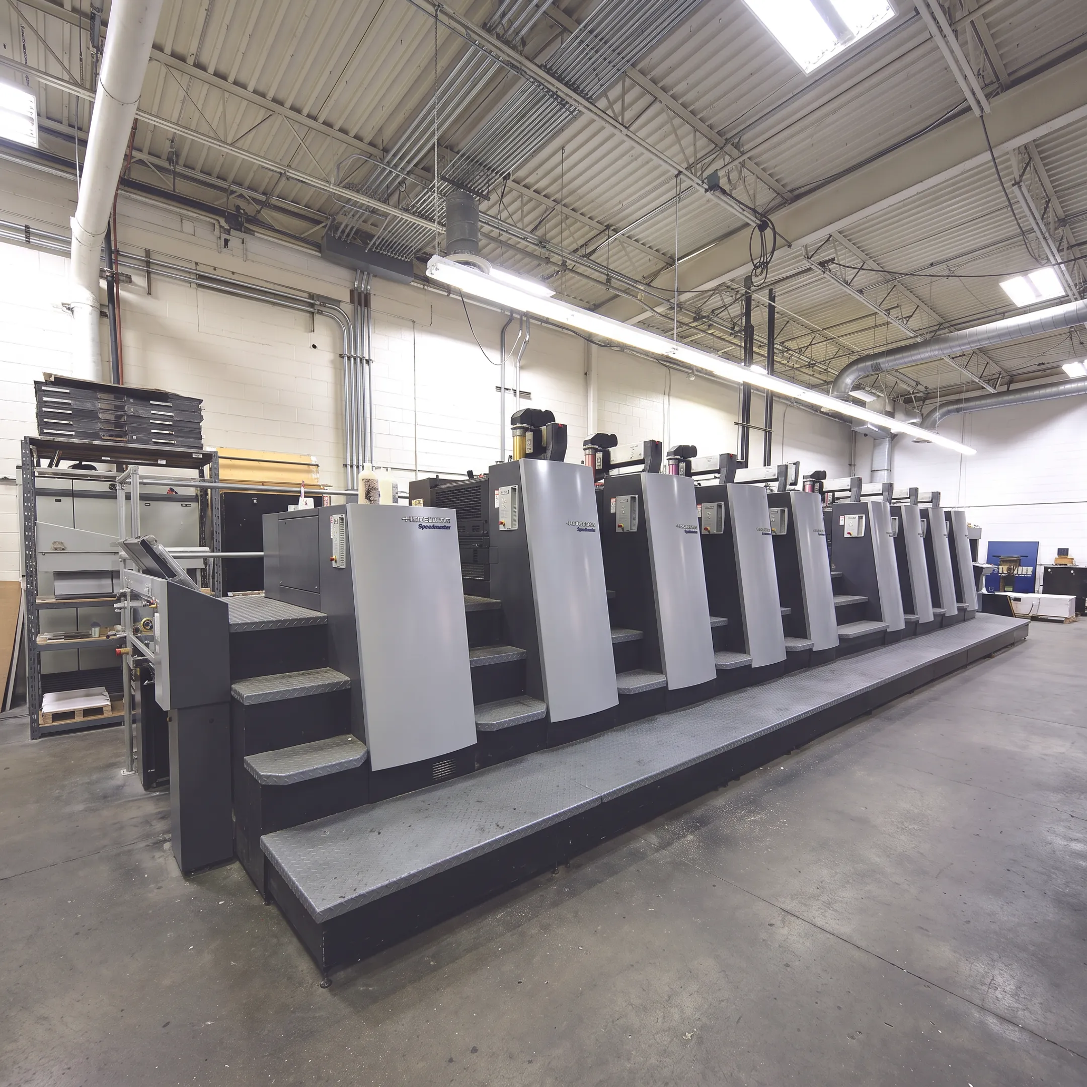 Digital XPress team producing printed materials in an Albany print facility