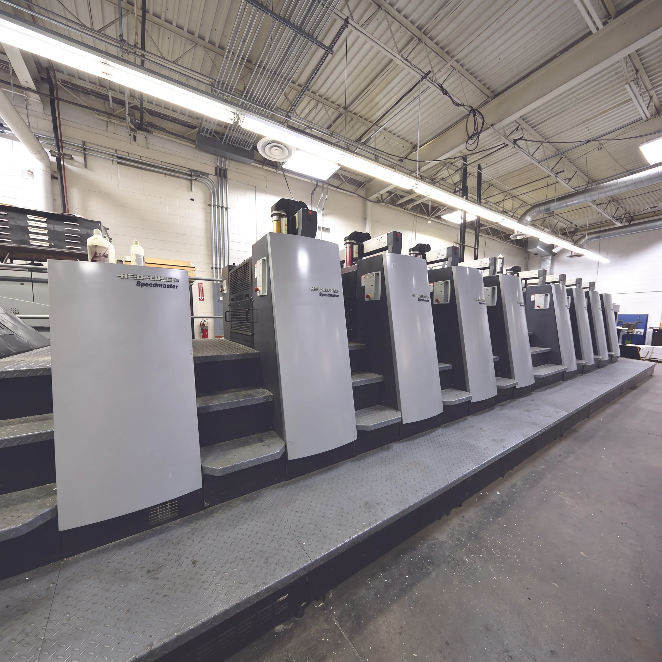 Digital XPress team producing commercial print materials in a modern production facility