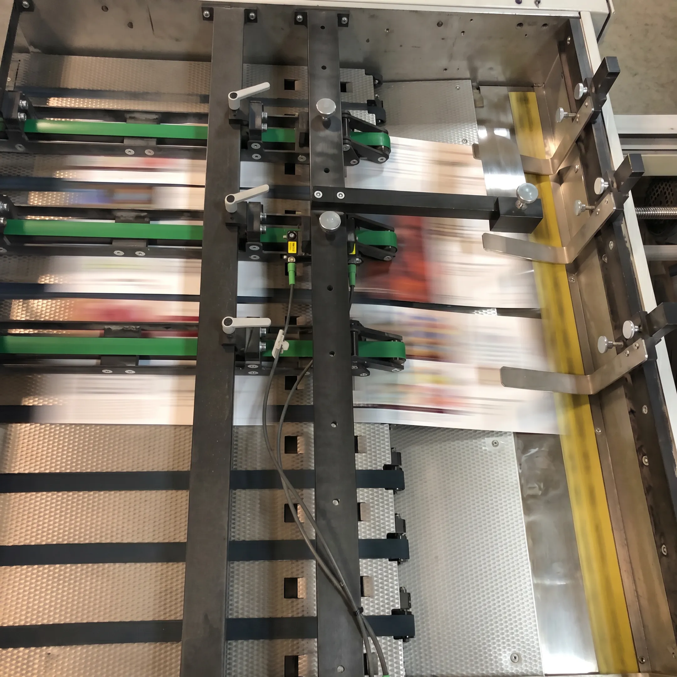 Printed campaign materials being finished and prepared for mailing