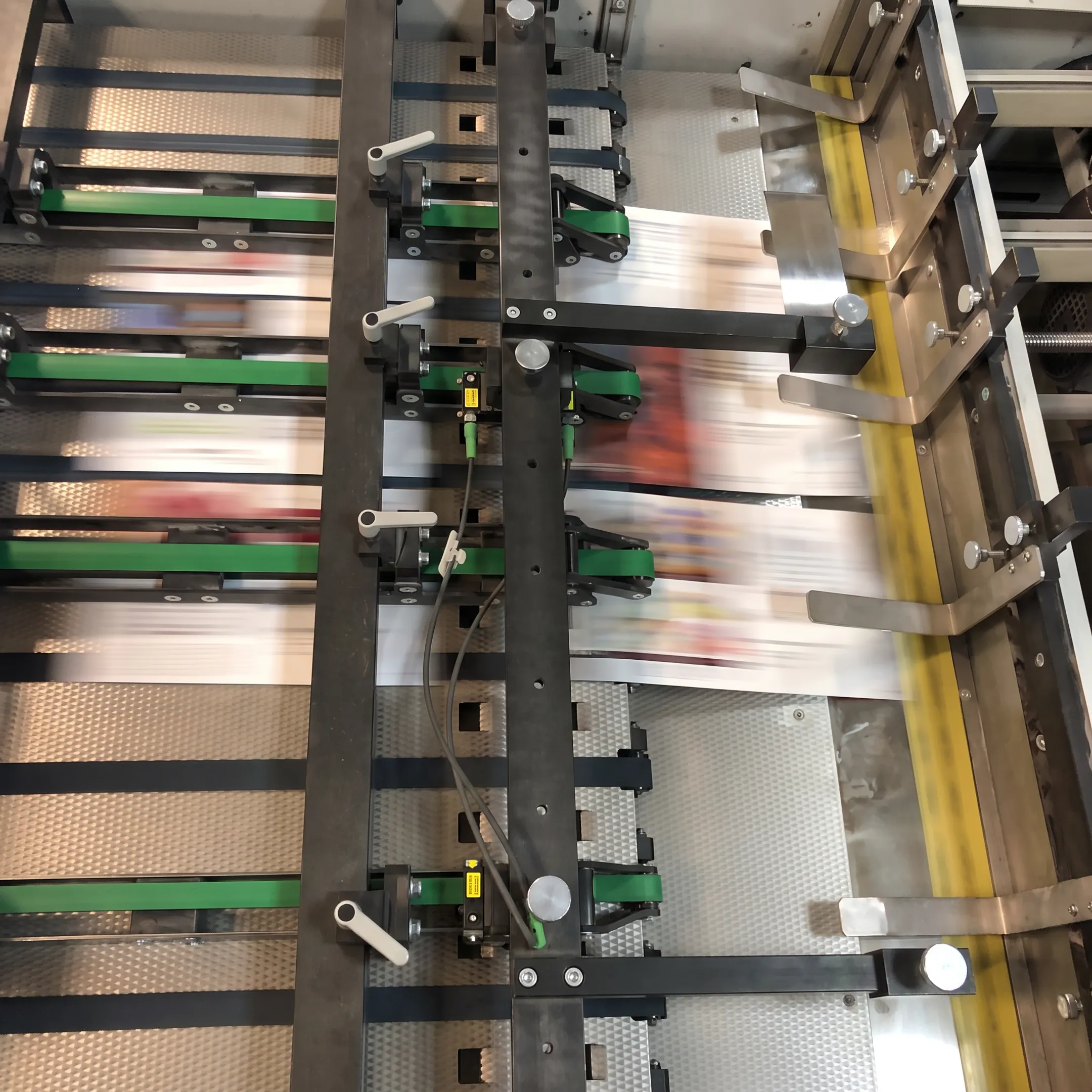 Printed utility bills being prepared for mailing in a professional print facility