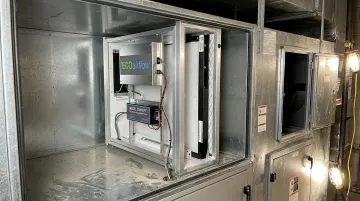 ECOairflow EPT Model 2300 electronic polarization filter unit installed in commercial HVAC air handler