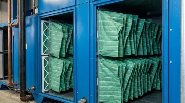 Extended surface bag pocket filters installed inside commercial AHU filter bank housing