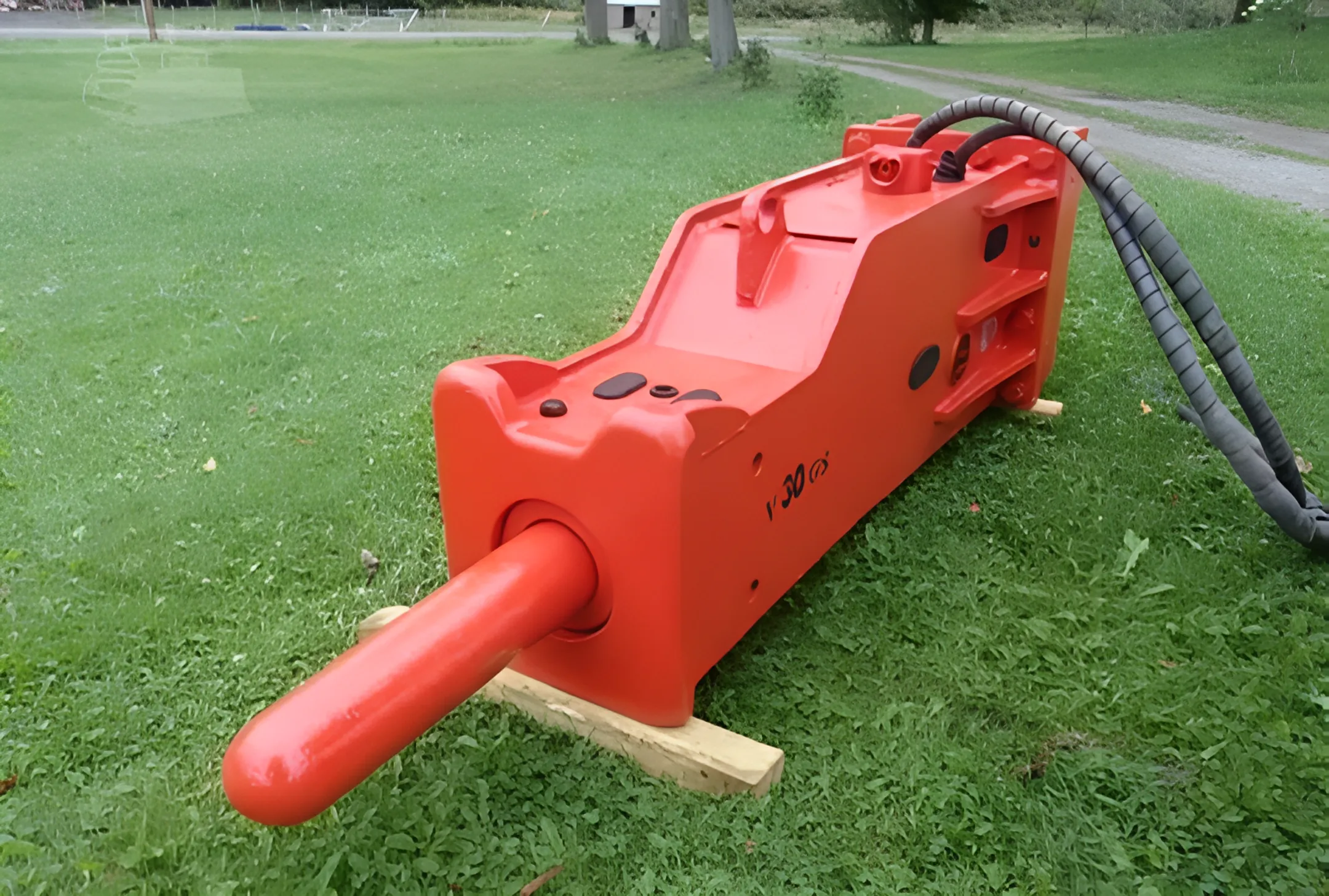 Excavation contractor using a hydraulic breaker