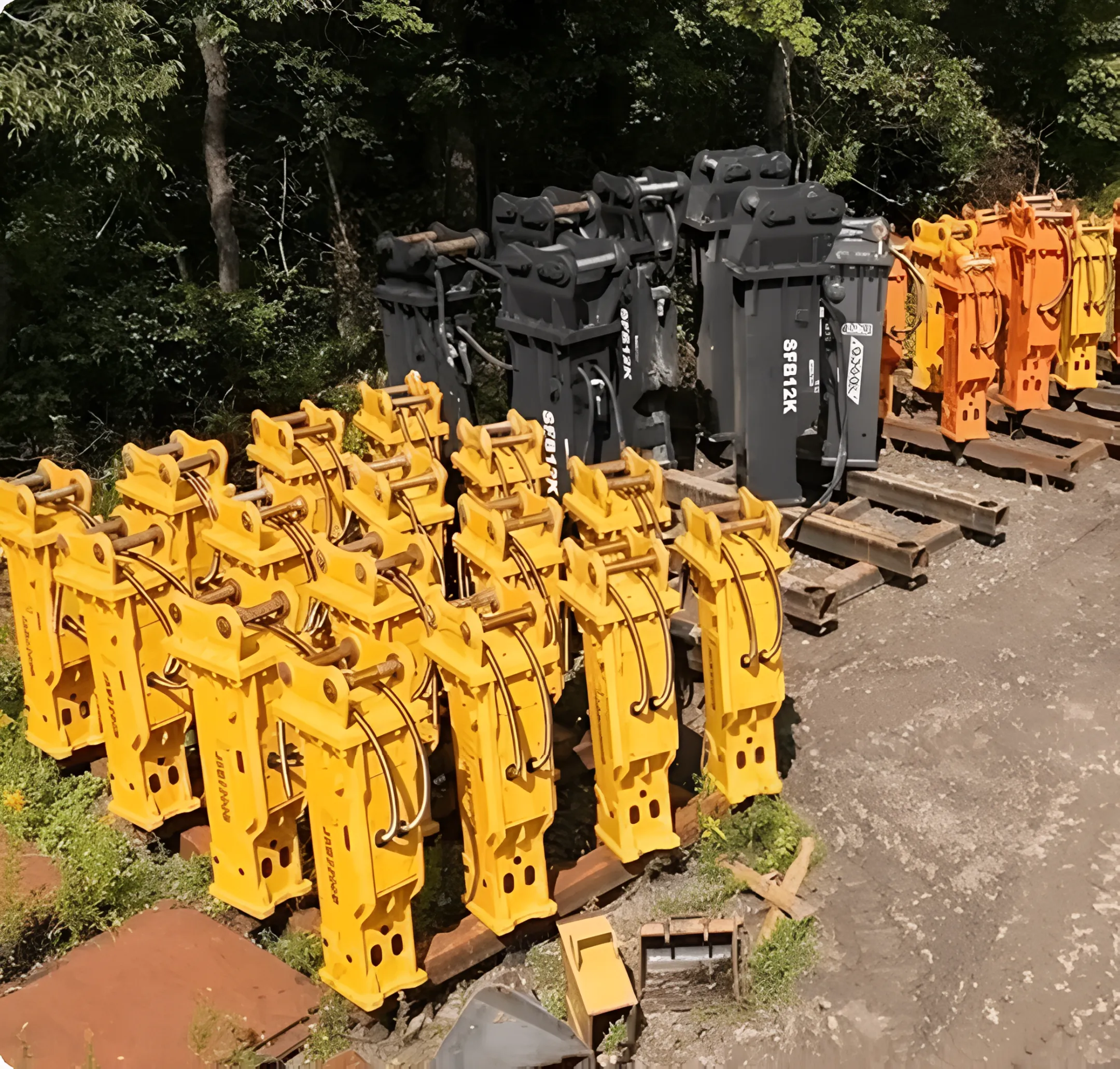Used excavator attachments at an equipment yard