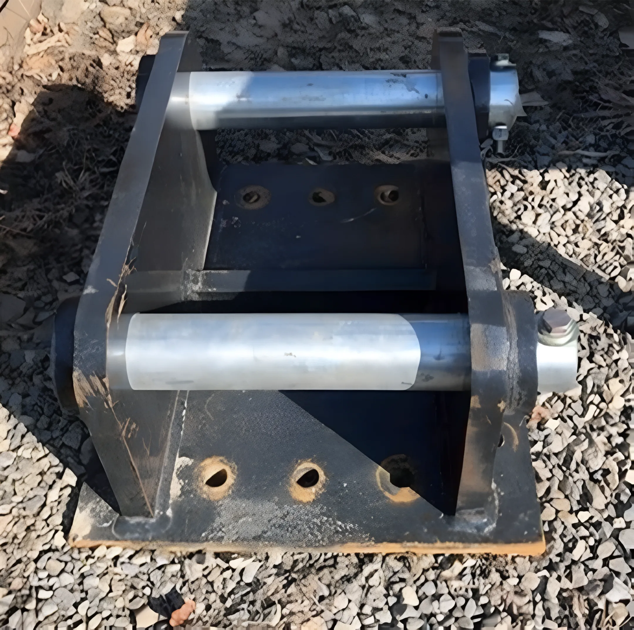 Excavator attachments at equipment rental yard