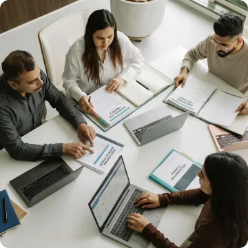 Consultants reviewing medical device audit documentation