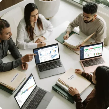 Regulatory team reviewing adverse event reporting data