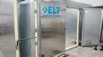 Insulated foam-core wall panels with cam-lock hardware assembly