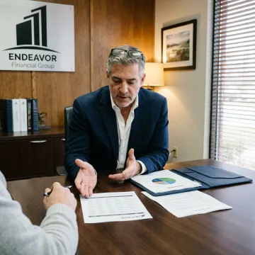Advisor guiding clients through a retirement planning process