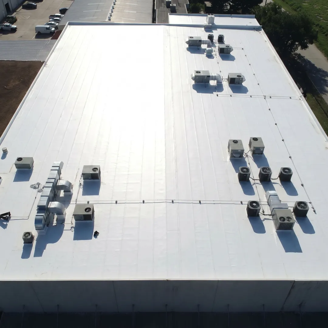 White TPO membrane roof on commercial building