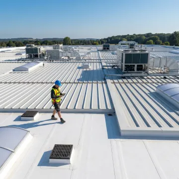 Industrial roofing inspection on a large commercial facility