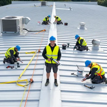 Inspection and repair process on a warehouse metal roof