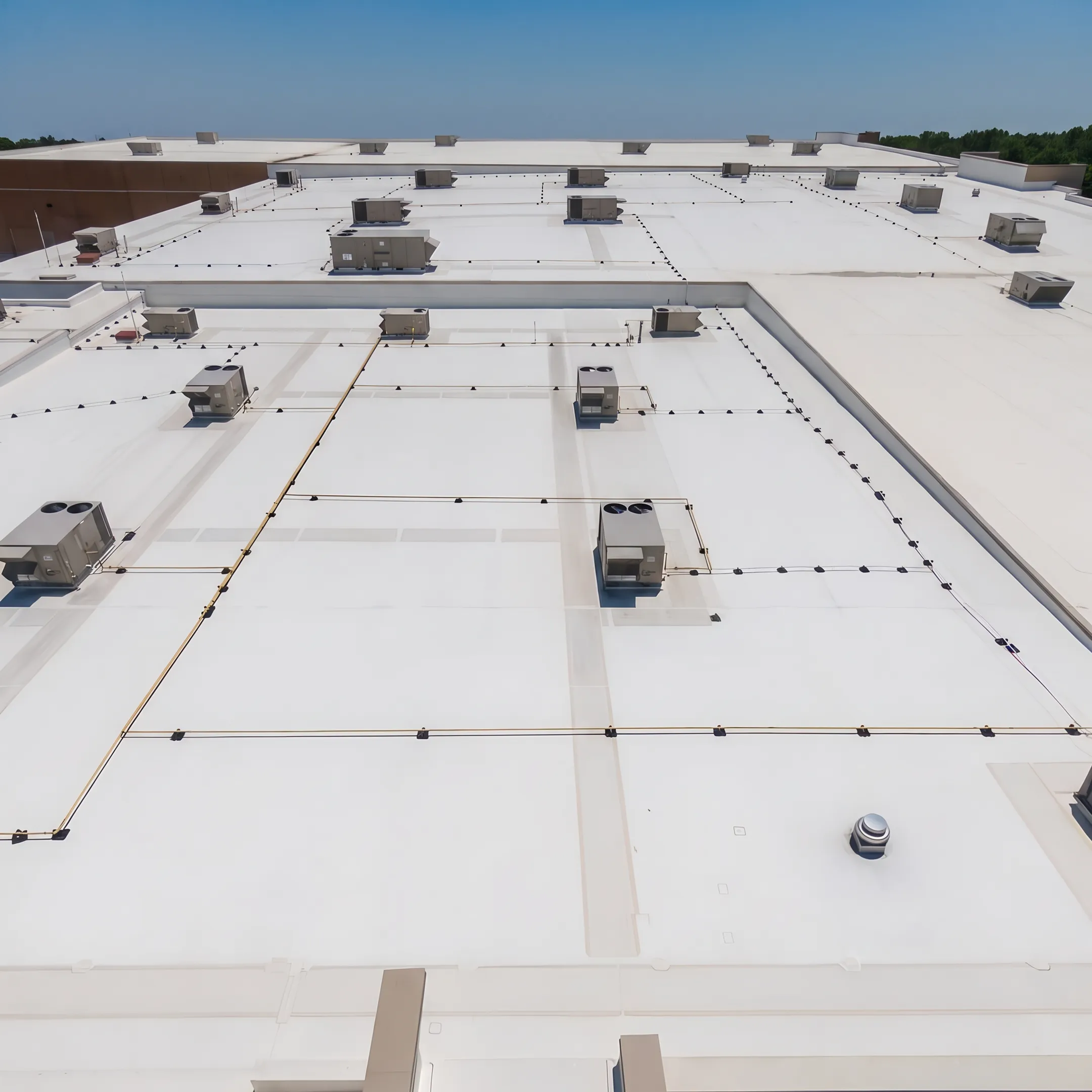 White PVC membrane roof on a commercial facility