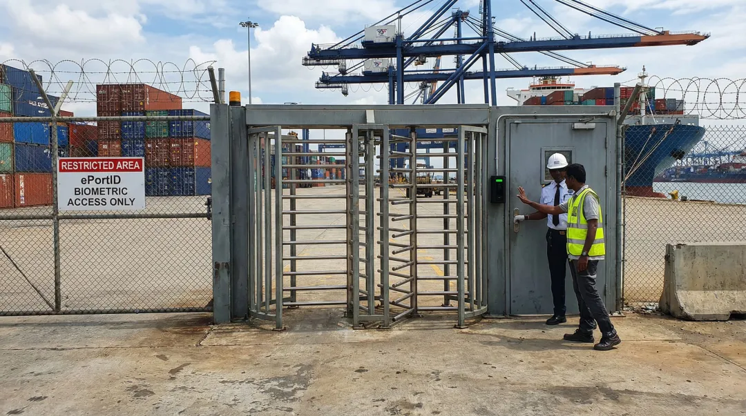 Biometric palm vein scanner deployed at industrial facility access checkpoint