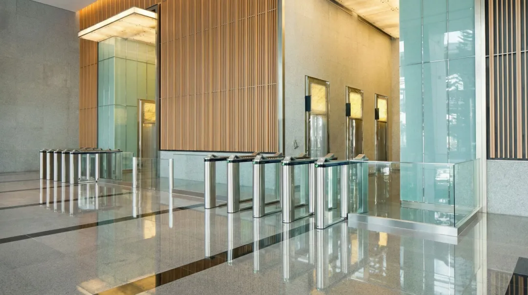 Modern commercial building lobby with keycard access control reader at entry