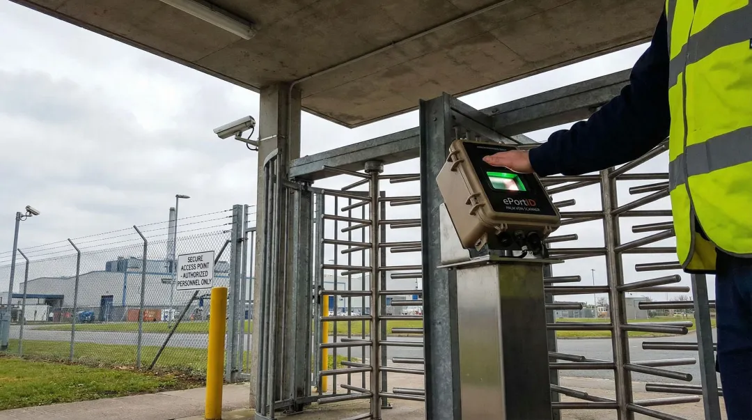 ePortID contactless palm vein biometric scanner installed at industrial facility gate entry point