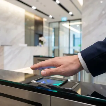Contactless biometric identity verification scanner in use
