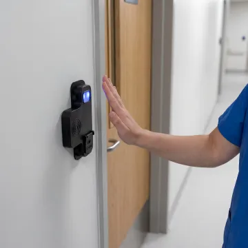 Hospital staff using contactless biometric access