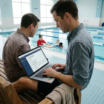 Parent registering a child for swim lessons online