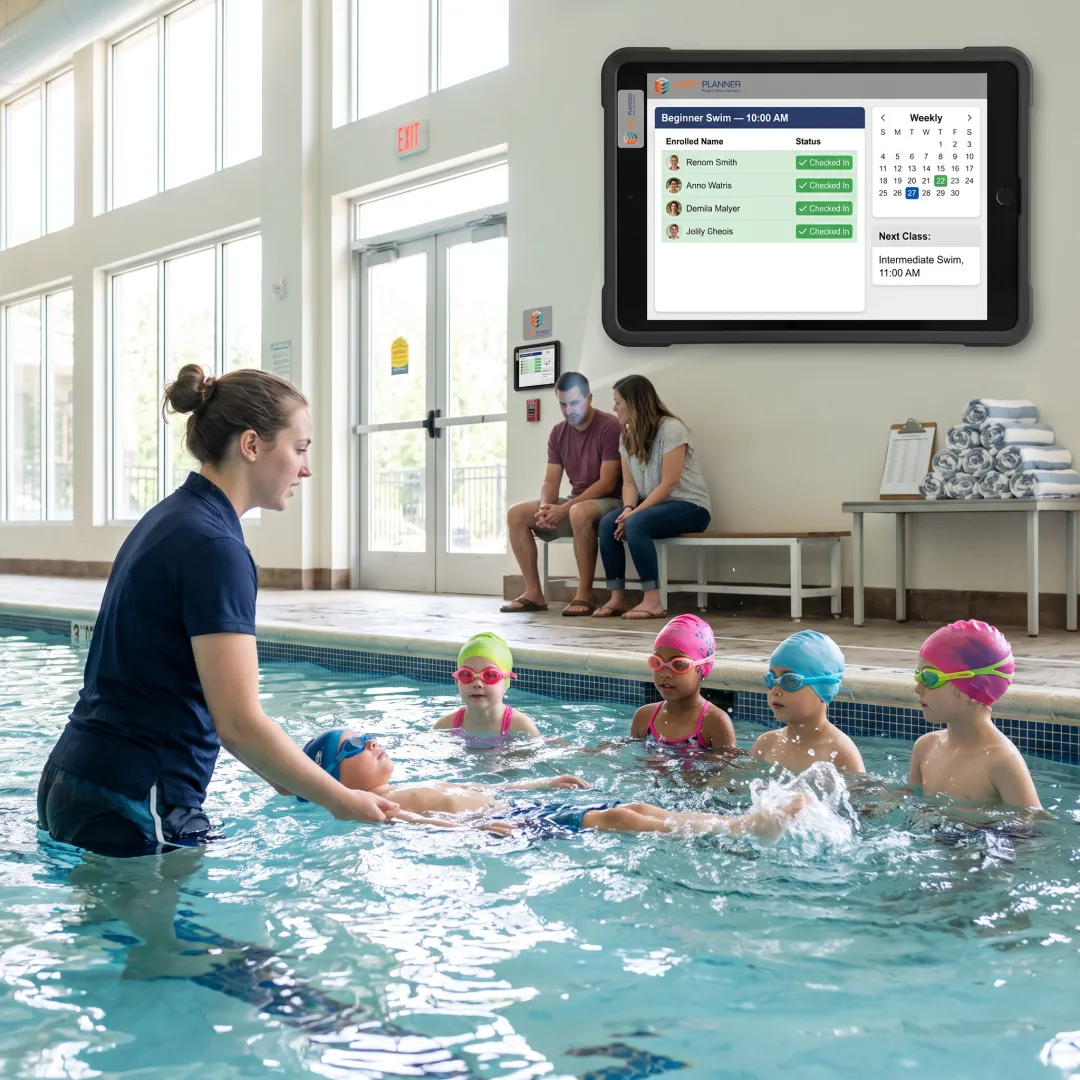 Swim instructor guiding children during a pool lesson