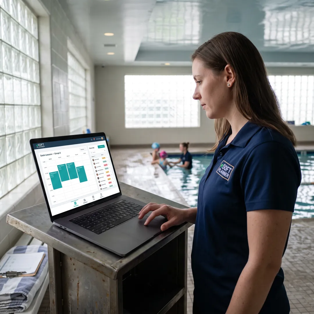 Staff member managing swim lesson bookings