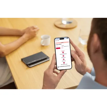 Swim club owner managing program schedule software