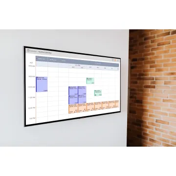 Sports staff managing schedules on software
