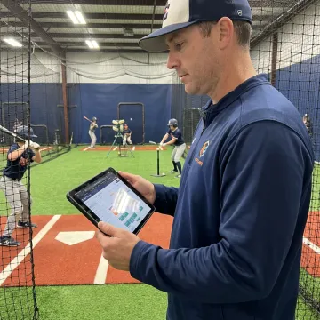 Coach managing baseball lesson bookings online