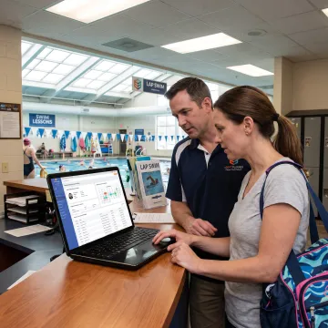 Member portal on laptop at a swim club