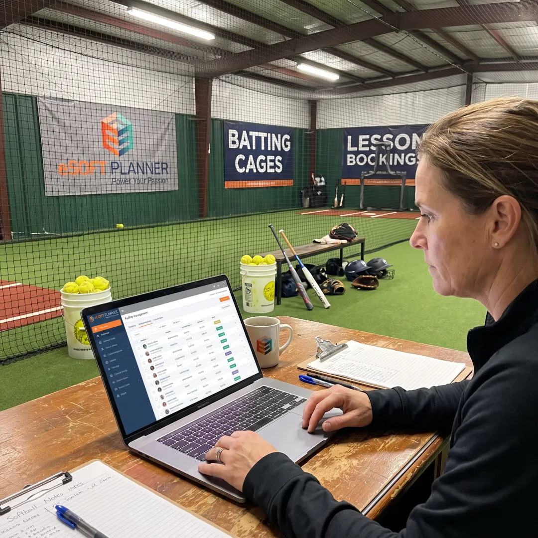 Coach using softball facility CRM software