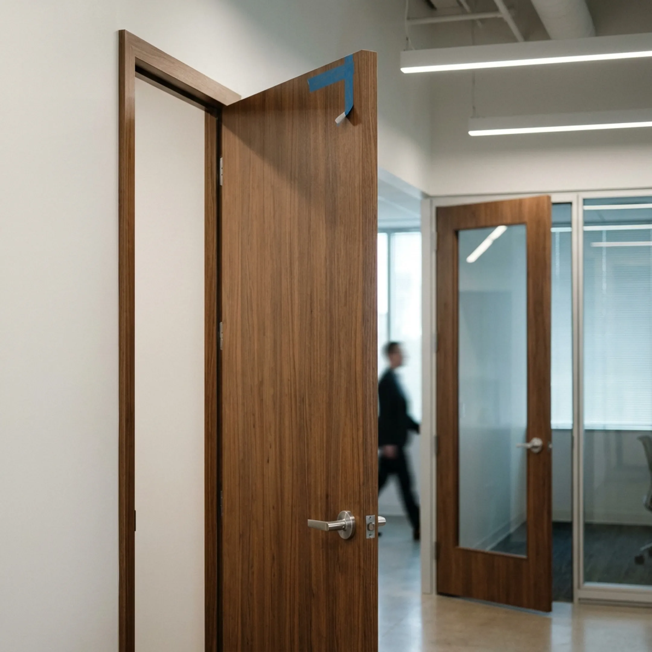 Frameless doors in an office