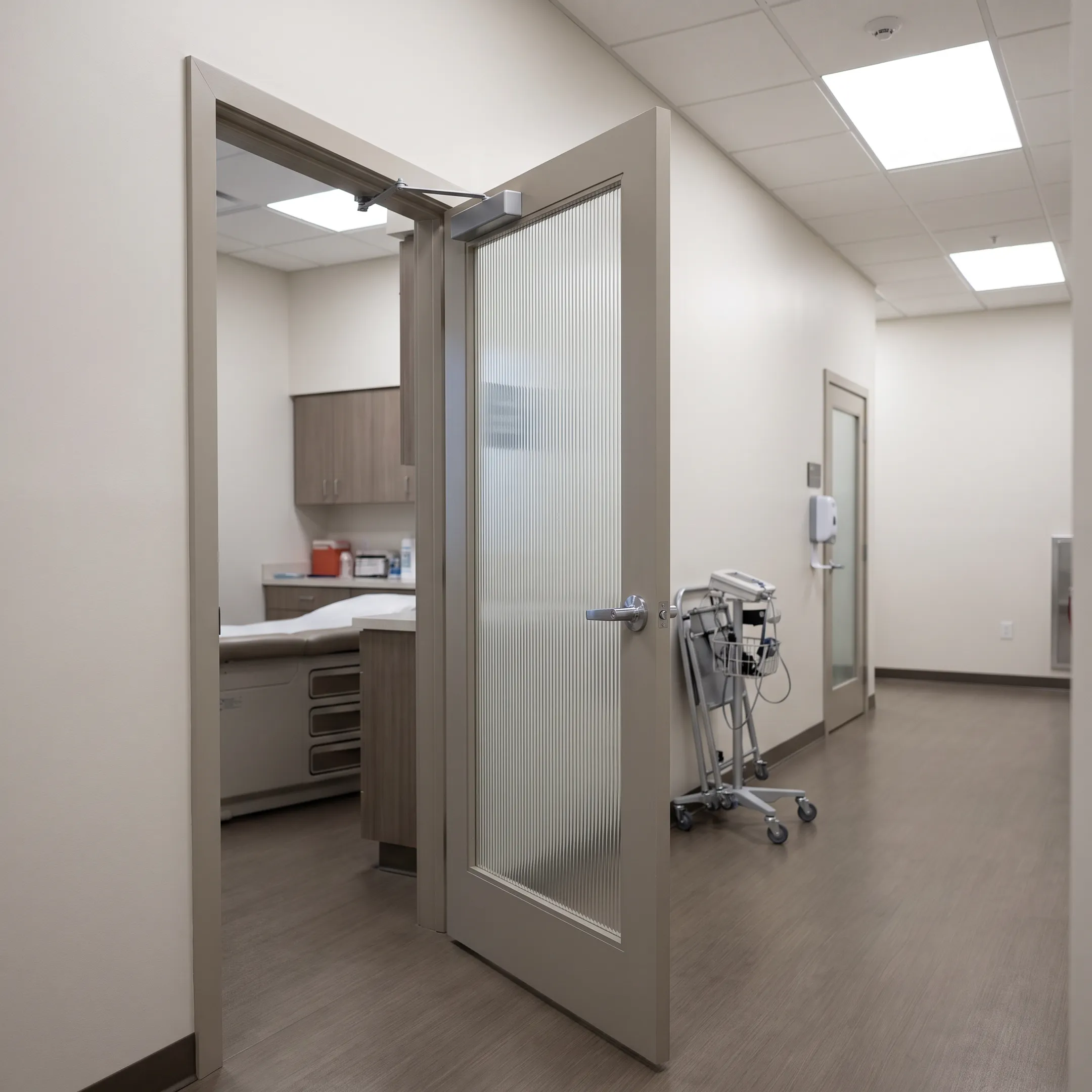 Medical office with a narrow reeded glass door